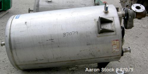 USED: Tank, 275 gallon, 304 stainless steel, vertical. Approximate 36" diameter x 60" straight side. Flat top, dish bottom. Openings: top (3) 2", (2) 3"; 2" center bottom outlet. (4) Side lug mounts.