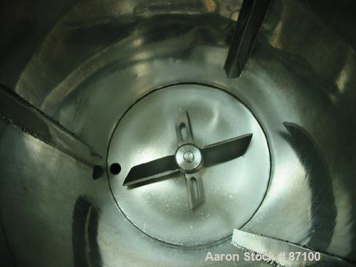USED: Mix tank, approximate 25 gallon, stainless steel. Non-jacketed chamber 17-1/2" diameter x 25" deep. Flat open top with cover, flat bottom. 4 blade bottom driven impeller. 1-1/2" diameter outlet...