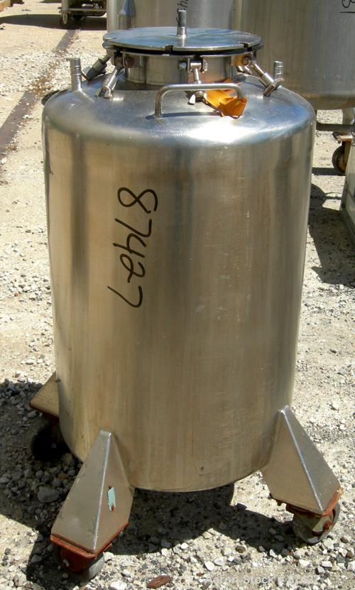 USED: Tank, 25 gallon, 304 stainless steel, vertical. 18" diameter x 24" straight side, dish top and bottom. Openings: top (2) 1/2", 7" with cover; 5/8" center bottom outlet. Mounted on 4 stainless s...