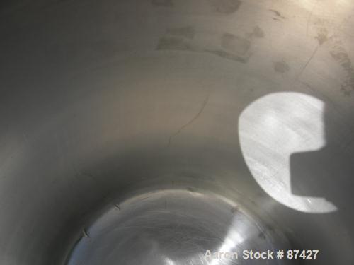 USED: Tank, 25 gallon, 304 stainless steel, vertical. 18" diameter x 24" straight side, dish top and bottom. Openings: top (2) 1/2", 7" with cover; 5/8" center bottom outlet. Mounted on 4 stainless s...