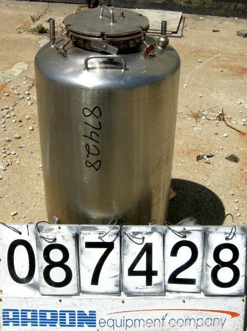 USED: Tank, 25 gallon, 304 stainless steel, vertical. 18" diameter x 24" straight side, dish top and bottom. Openings: top (2) 1/2", 7" with cover; 5/8" NPT center bottom outlet. Mounted on 4 stainle...
