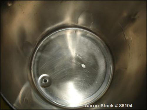 USED: Tank, 60 gallon, stainless steel, vertical. 24" diameter x 28" straight side. Open top with cover, sloped bottom. 1" off center bottom outlet. Mounted on 4 stainless steel legs with casters.
