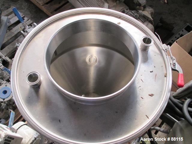 Used Tank, 20 Gallon, Stainless Steel, Vertical. 21" Diameter x 11" straight side x 12" coned bottom, flat top. 1" off center bottom outlet. Mounted on 4 legs with casters.