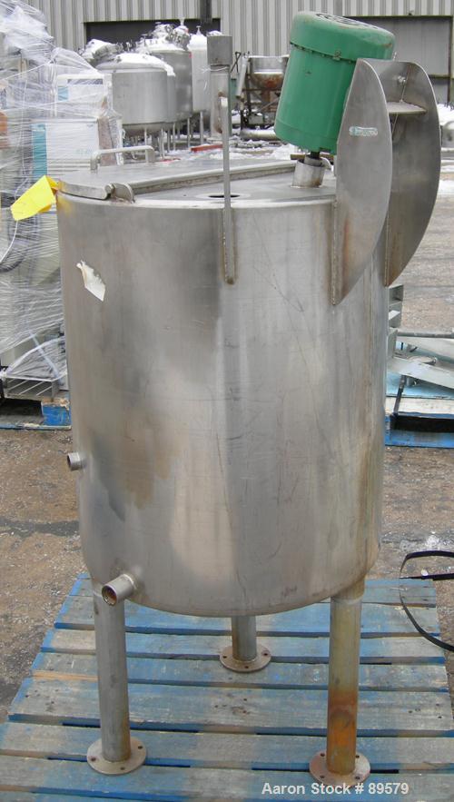 USED: Tank, 55 gallon, 304 stainless steel, vertical. 24" diameter x 29" straight side. Flat top with a 1/2 hinged cover, slight coned bottom. Clamp-on agitator, 3/4" diameter shaft with a 3 blade tu...