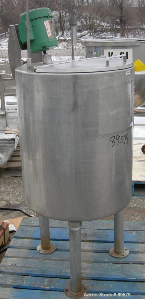 USED: Tank, 55 gallon, 304 stainless steel, vertical. 24" diameter x 29" straight side. Flat top with a 1/2 hinged cover, slight coned bottom. Clamp-on agitator, 3/4" diameter shaft with a 3 blade tu...