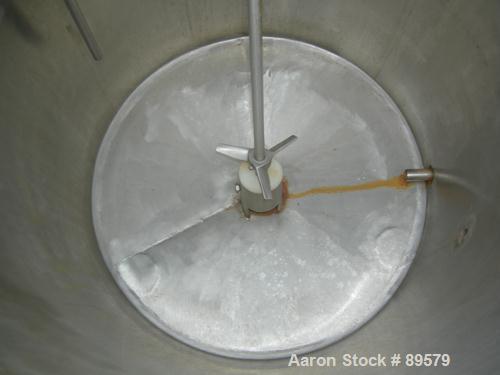 USED: Tank, 55 gallon, 304 stainless steel, vertical. 24" diameter x 29" straight side. Flat top with a 1/2 hinged cover, slight coned bottom. Clamp-on agitator, 3/4" diameter shaft with a 3 blade tu...