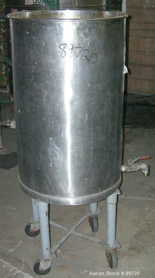 USED: Tank, 55 gallon, 304 stainless steel, vertical. 22" diameter x 35" straight side, open top, no cover, flat bottom. Approximate 1" side bottom outlet. Mounted on 4 carbon steel legs with casters...