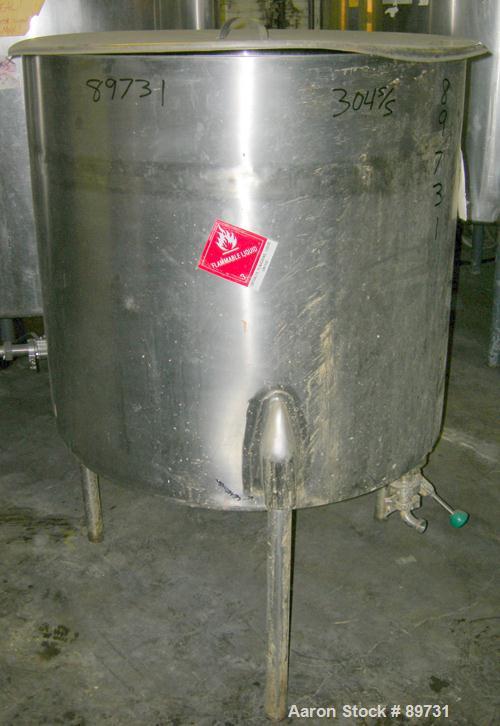 USED: Tank, 175 gallon, 304 stainless steel, vertical. 38" diameter x 35" straight side, open top with cover, sloped bottom. Approximate 1" off center bottom outlet. Mounted on 3 stainless steel legs...