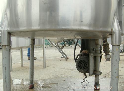 USED: Tank, 225 gallon, 304 stainless steel, vertical. 38" diameter x 48" straight side, open top, no cover, flat bottom. Approximate 1" off center bottom outlet, side bottom 3 blade agitator, driven...