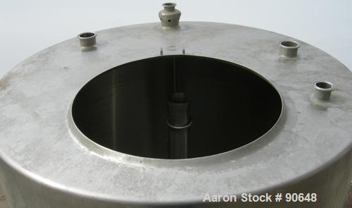 USED: Tank, 290 gallon, 304 stainless steel, vertical. Approximate38" diameter x 60" straight side. Flat top, sloped bottom. Openings:top (2) 1-1/2" tri clamp, (2) 2" tri clamp, 17-1/2" manway with c...