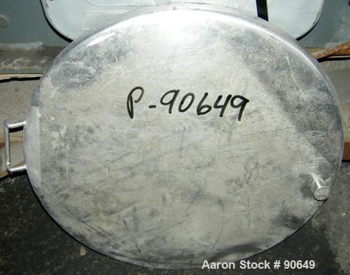 USED: Tank, 290 gallon, 304 stainless steel, vertical. Approximate38" diameter x 60" straight side. Flat top, sloped bottom. Openings:top (2) 1-1/2" tri clamp, (2) 2" tri clamp, 17-1/2" manway with c...