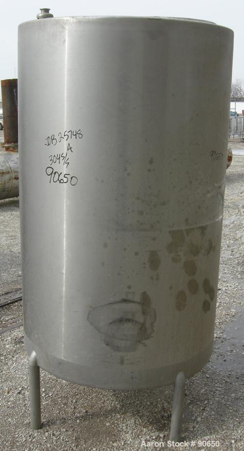 USED: Tank, 290 gallon, 304 stainless steel, vertical. Approximate38" diameer x 60" straight side. Flat top, sloped bottom. Openings:top (2) 1-1/2" tri clamp, (2) 2" tri clamp, 17-1/2" manway with co...