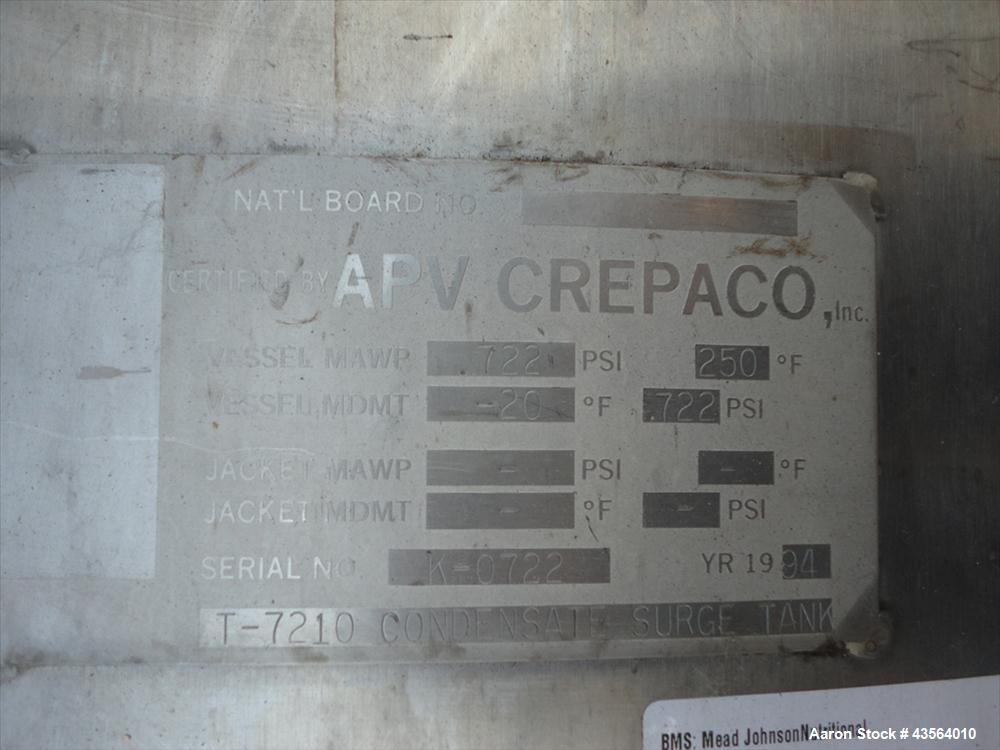 Used APV Crepaco Tank, 330 Gallon, Stainless Steel. Approximately 48" diameter x 42" straight side, dish top, flat bottom, rated 0.722 psi at 250 f internal, 18" man way, 6", (4)3" top nozzles, 4" si...