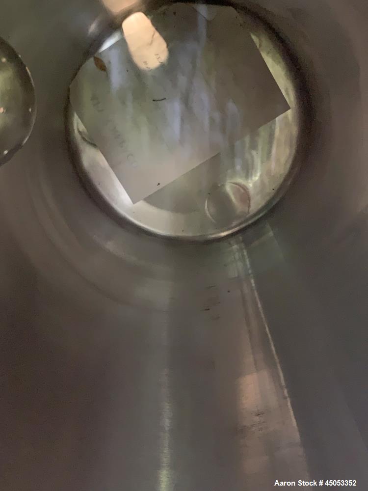 UNUSED- APV Crepaco 20 Gallon Single Wall Stainless Steel Tank. Has 2.5" sprayball with a 270 degree pattern at up to 40 gpm. Tanks are 304 stainless steel with #4 finish with welds stripe bead glass...