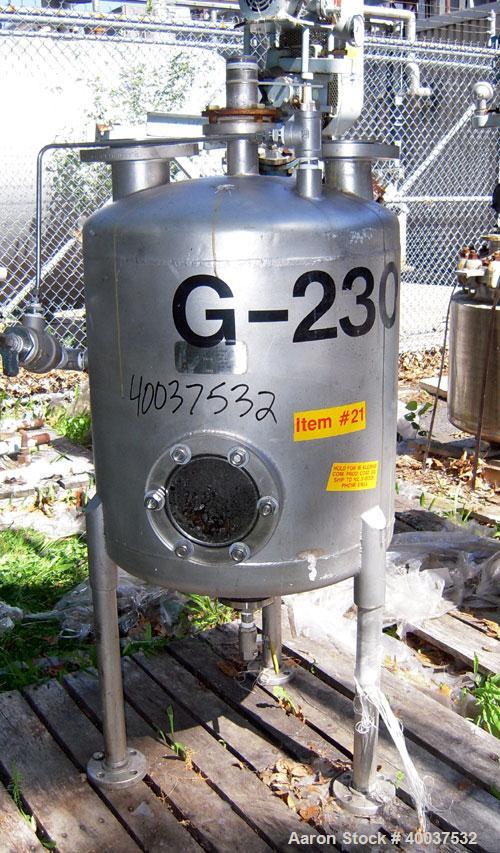 Used Acme Industrial Pressure Tank, 50 gallon, stainless steel, vertical. 24" diameter x 24" straight side, dished top and bottom. Internal rated FV/15 psi at 100 deg.f.. Openings top 2", 3", 4". Sid...