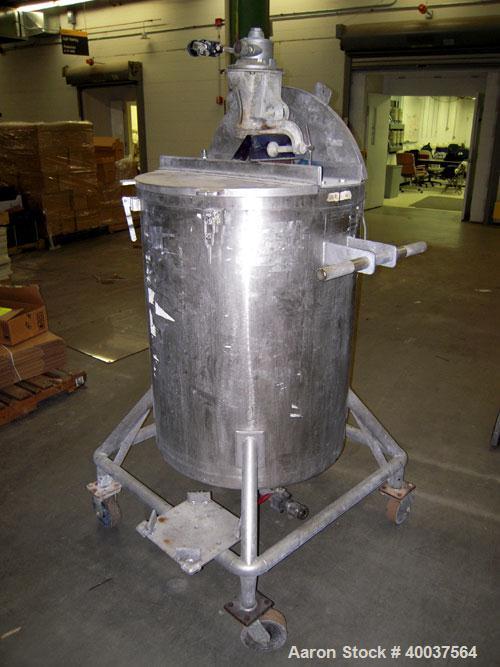 Used Acme Tank, 95 gallon, stainless steel, vertical. 28" diameter x 36" straight side, rated atmo at 325 deg.f.. Open top with (2) 1/3 hinged covers, dished bottom. Stainless steel bolt on agitator ...