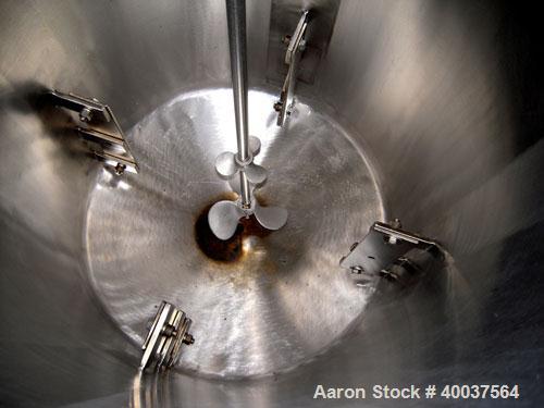 Used Acme Tank, 95 gallon, stainless steel, vertical. 28" diameter x 36" straight side, rated atmo at 325 deg.f.. Open top with (2) 1/3 hinged covers, dished bottom. Stainless steel bolt on agitator ...