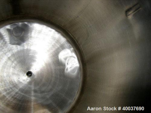 Used Acme Pressure Tank, 40 gallon, Stainless steel, Vertical. 22" diameter x 24" straight side, dished top and bottom. Internal rated 100/fv at 325 deg.f.. Openings top 10". 1" center bottom outlet....