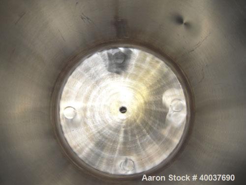 Used Acme Pressure Tank, 40 gallon, Stainless steel, Vertical. 22" diameter x 24" straight side, dished top and bottom. Internal rated 100/fv at 325 deg.f.. Openings top 10". 1" center bottom outlet....
