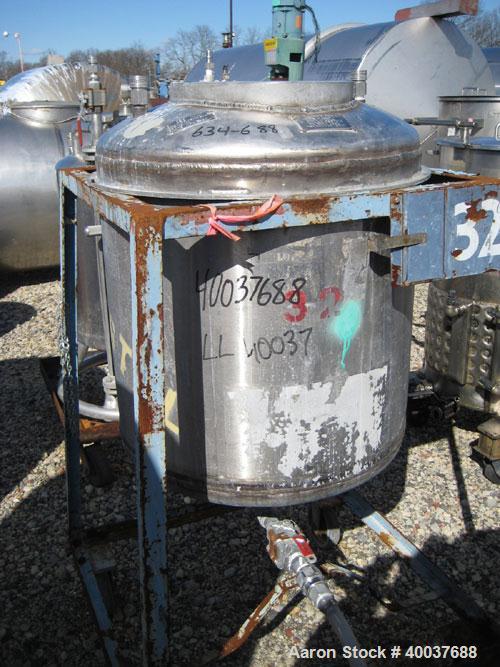 Used Allcraft Pressure Tank, 50 Gallon, Stainless steel, Vertical. 24'' diameter x 24'' straight side, dished top and bottom. Internal rated 50 psi at 300 deg F. Top manway, center bottom outlet. Mou...