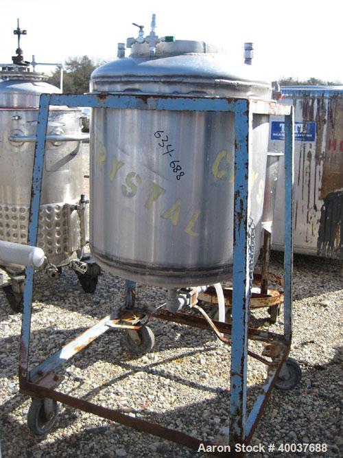 Used Allcraft Pressure Tank, 50 Gallon, Stainless steel, Vertical. 24'' diameter x 24'' straight side, dished top and bottom. Internal rated 50 psi at 300 deg F. Top manway, center bottom outlet. Mou...
