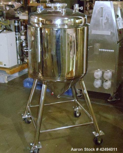 Used Alloy Product Pressure Tank, 40 Gallon, 316L Stainless Steel, Vertical. 24’’ Diameter x 20’’ straight side, dished top, coned bottom. Internal rated 50 psi at 300 degrees F.. Openings top (4) 1-...