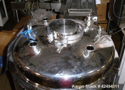 Used Alloy Product Pressure Tank, 40 Gallon, 316L Stainless Steel, Vertical. 24’’ Diameter x 20’’ straight side, dished top, coned bottom. Internal rated 50 psi at 300 degrees F.. Openings top (4) 1-...