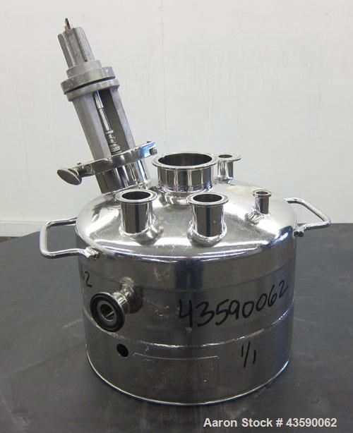 Used Alloy Products Pressure Tank, 2 Gallon, 316L Stainless Steel, Vertical. 12” Diameter x 4” straight side. Dished top and bottom. Internal rated 125 psi at -20 to 100 degrees F. Off center top ent...