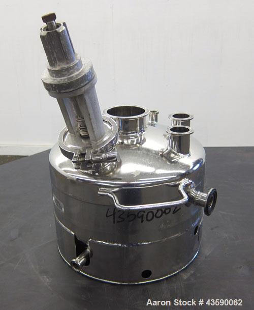 Used Alloy Products Pressure Tank, 2 Gallon, 316L Stainless Steel, Vertical. 12” Diameter x 4” straight side. Dished top and bottom. Internal rated 125 psi at -20 to 100 degrees F. Off center top ent...