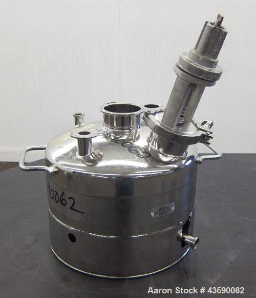 Used Alloy Products Pressure Tank, 2 Gallon, 316L Stainless Steel, Vertical. 12” Diameter x 4” straight side. Dished top and bottom. Internal rated 125 psi at -20 to 100 degrees F. Off center top ent...