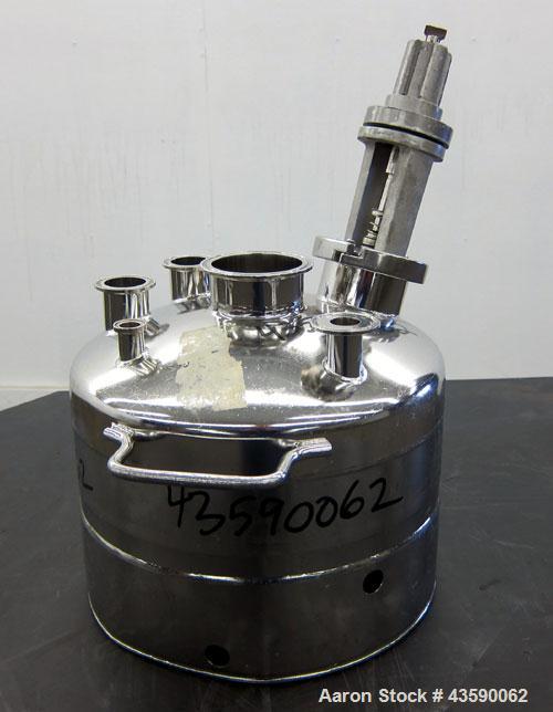 Used Alloy Products Pressure Tank, 2 Gallon, 316L Stainless Steel, Vertical. 12” Diameter x 4” straight side. Dished top and bottom. Internal rated 125 psi at -20 to 100 degrees F. Off center top ent...