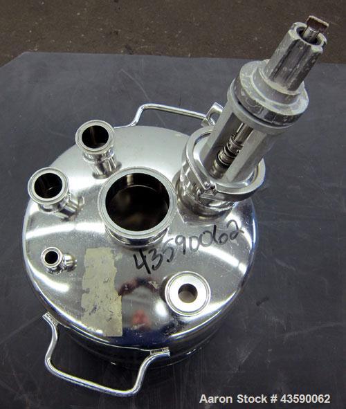 Used Alloy Products Pressure Tank, 2 Gallon, 316L Stainless Steel, Vertical. 12” Diameter x 4” straight side. Dished top and bottom. Internal rated 125 psi at -20 to 100 degrees F. Off center top ent...