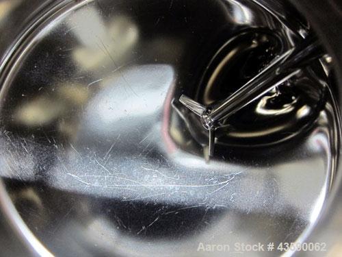 Used Alloy Products Pressure Tank, 2 Gallon, 316L Stainless Steel, Vertical. 12” Diameter x 4” straight side. Dished top and bottom. Internal rated 125 psi at -20 to 100 degrees F. Off center top ent...