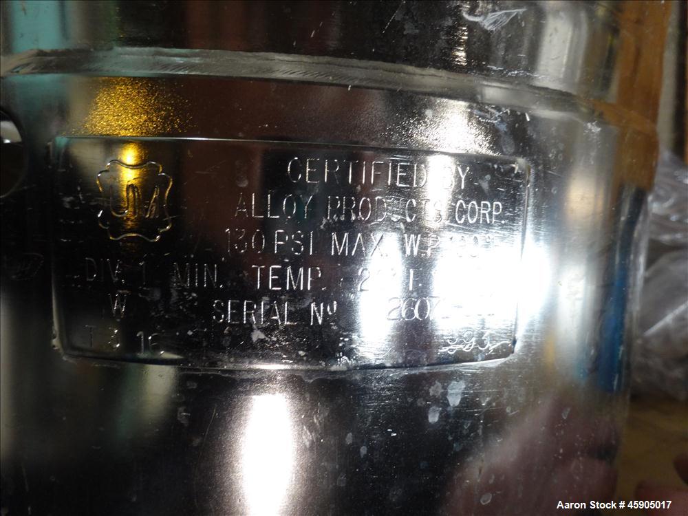 Used Alloy Products Pressure Tank, 6 Gallon, 316L Stainless Steel, Vertical. Approximate 12" diameter x 13" straight side, dished top and bottom. Internal rated 130 psi at -20 to 100 degrees F. Openi...