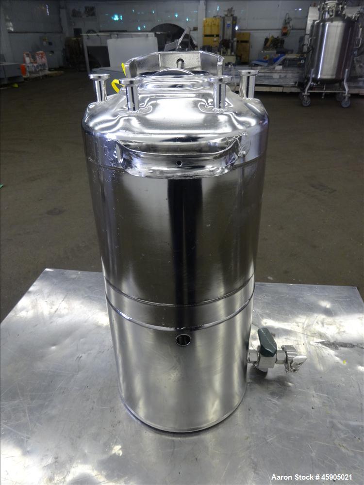 Used Alloy Products Pressure Tank, 2 Gallon, 316 Stainless Steel, Vertical. Approximate 9" diameter x 8" straight side, dished top and bottom. Internal rated 140 psi at -20 to 100 degrees F. Openings...