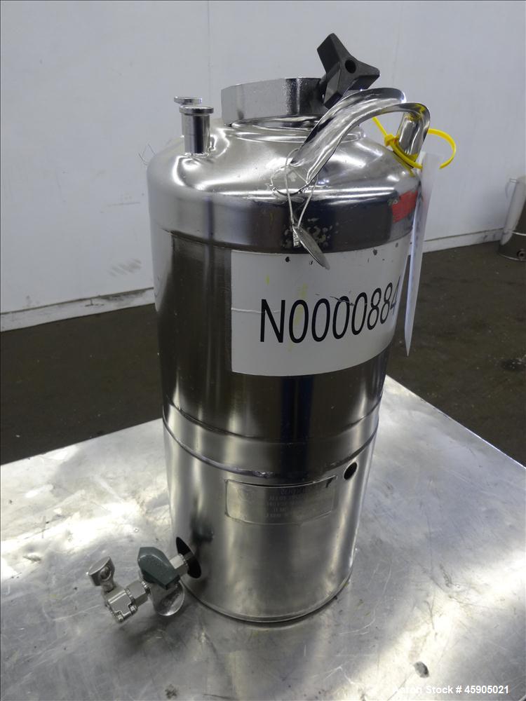 Used Alloy Products Pressure Tank, 2 Gallon, 316 Stainless Steel, Vertical. Approximate 9" diameter x 8" straight side, dished top and bottom. Internal rated 140 psi at -20 to 100 degrees F. Openings...