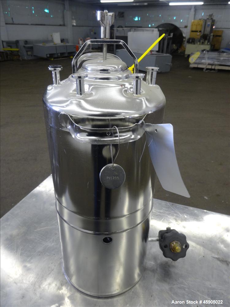 Used Alloy Products Pressure Tank, 2 Gallon, 316 Stainless Steel, Vertical. Approximate 9" diameter x 8" straight side, dished top and bottom. Internal rated 140 psi at -20 to 100 degrees F. Openings...