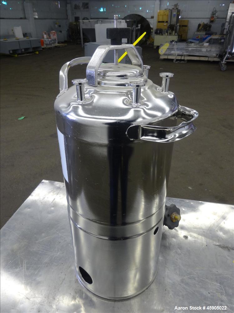 Used Alloy Products Pressure Tank, 2 Gallon, 316 Stainless Steel, Vertical. Approximate 9" diameter x 8" straight side, dished top and bottom. Internal rated 140 psi at -20 to 100 degrees F. Openings...