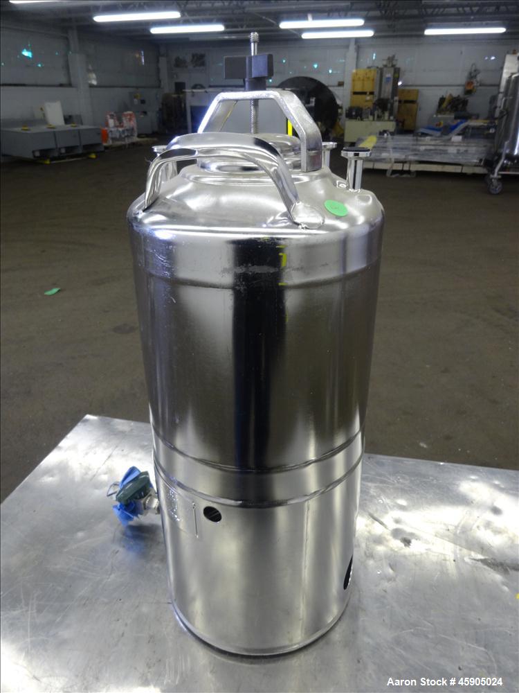 Used Alloy Products Pressure Tank, 2 Gallon, 316 Stainless Steel, Vertical. Approximate 9" diameter x 8" straight side, dished top and bottom. Internal rated 140 psi at -20 to 100 degrees F. Openings...