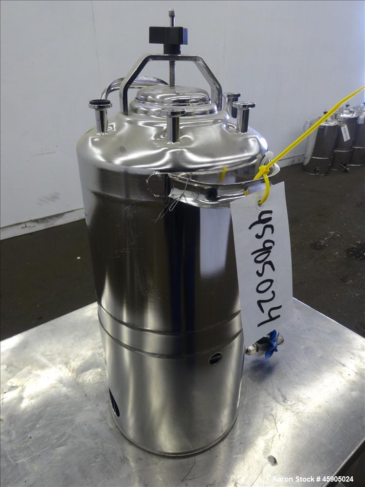 Used Alloy Products Pressure Tank, 2 Gallon, 316 Stainless Steel, Vertical. Approximate 9" diameter x 8" straight side, dished top and bottom. Internal rated 140 psi at -20 to 100 degrees F. Openings...