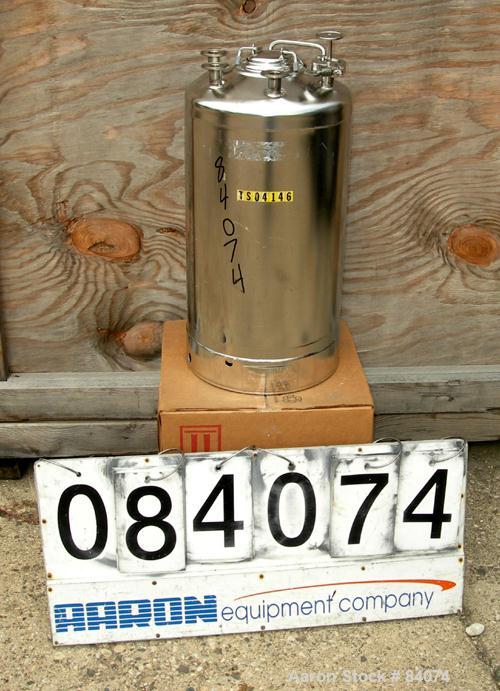 USED: Alloy Products pressure tank, 8 gallon, 316 stainless steel, vertical. 12" diameter x 18" straight side. Dished top and bottom. Internal rated 130 psi at 100 deg F. Openings top (4) 2" tri clam...