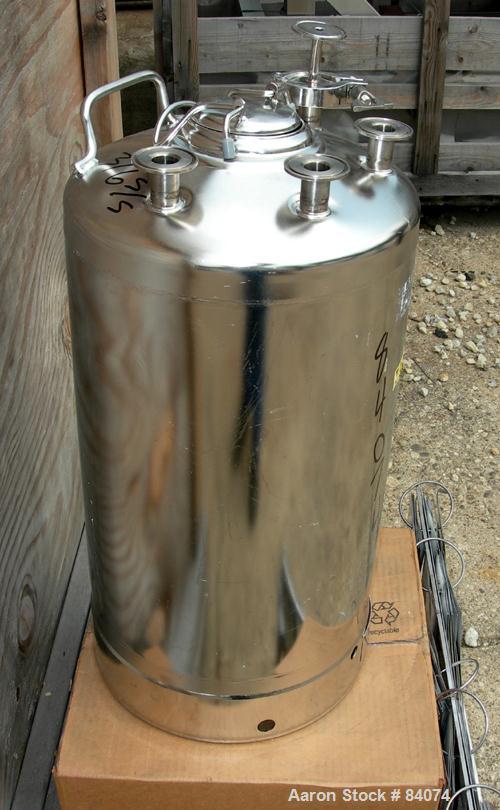 USED: Alloy Products pressure tank, 8 gallon, 316 stainless steel, vertical. 12" diameter x 18" straight side. Dished top and bottom. Internal rated 130 psi at 100 deg F. Openings top (4) 2" tri clam...