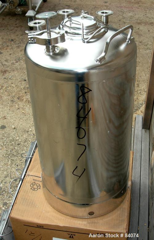 USED: Alloy Products pressure tank, 8 gallon, 316 stainless steel, vertical. 12" diameter x 18" straight side. Dished top and bottom. Internal rated 130 psi at 100 deg F. Openings top (4) 2" tri clam...
