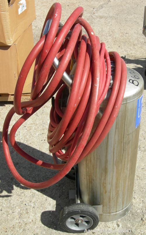 USED: Alloy Products pressure tank, 16 gallon, 304 stainless steel, vertical. 12" diameter x 28" straight side. Dish top and bottom. Internal rated 130 psi at 100 deg F. Top openings: 4" x 3" oval wi...