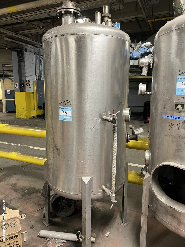 Used Alpha Stainless Tank, Approximate 250 Gallon, Stainless Steel, Vertical. Approximate 36" diameter x 57" straight side, dished top & bottom. Mounted on 4 stainless legs.