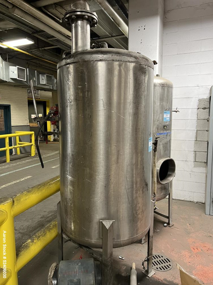 Used Alpha Stainless Tank, Approximate 250 Gallon, Stainless Steel, Vertical. Approximate 36" diameter x 57" straight side, dished top & bottom. Mounted on 4 stainless legs.