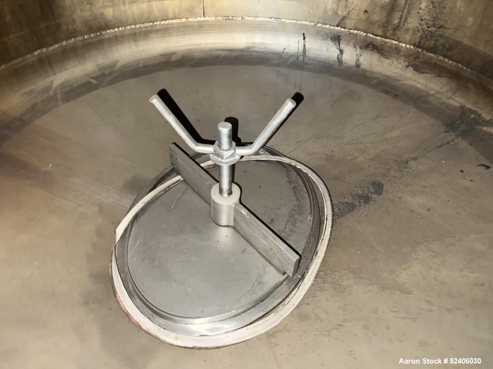Used Alpha Stainless Tank, Approximate 250 Gallon, Stainless Steel, Vertical. Approximate 36" diameter x 57" straight side, dished top & bottom. Mounted on 4 stainless legs.
