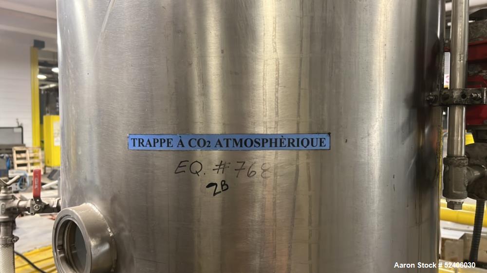 Used Alpha Stainless Tank, Approximate 250 Gallon, Stainless Steel, Vertical. Approximate 36" diameter x 57" straight side, dished top & bottom. Mounted on 4 stainless legs.