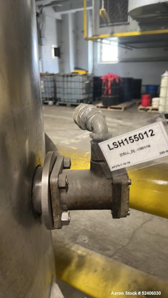 Used Alpha Stainless Tank, Approximate 250 Gallon, Stainless Steel, Vertical. Approximate 36" diameter x 57" straight side, dished top & bottom. Mounted on 4 stainless legs.