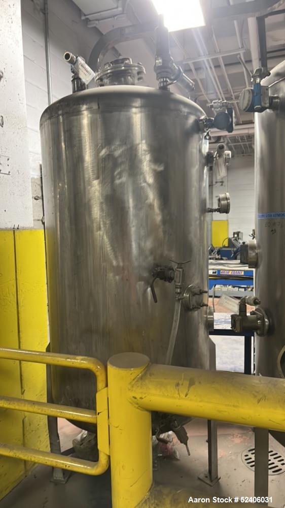 Used Alpha Stainless Tank, Approximate 250 Gallon, Stainless Steel, Vertical. Approximate 36" diameter x 57" straight side, dished top & bottom. Mounted on 4 stainless legs.
